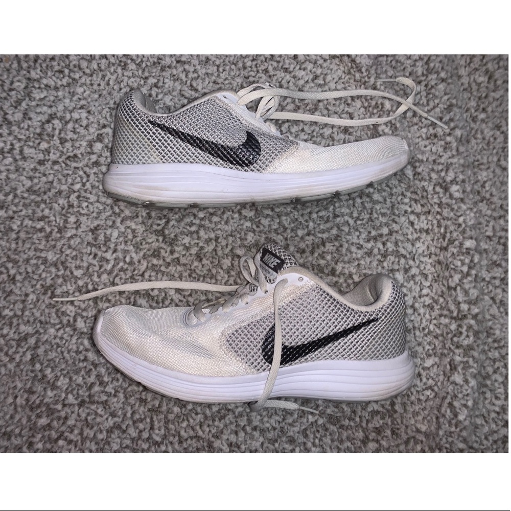 Nike grey and white running shoes